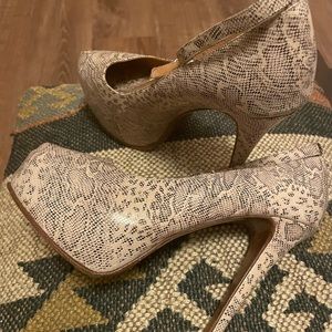 Shoes (platforms heels) animal print. Used only 2 times